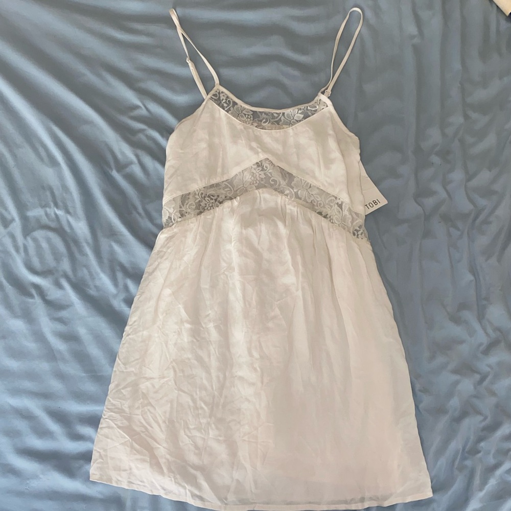 White lace cutout dress